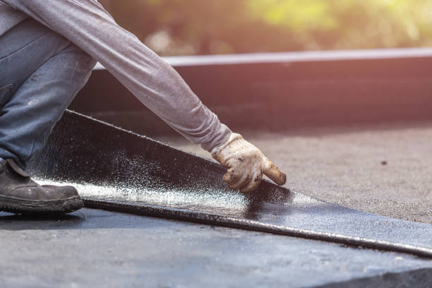 Professional Basement Waterproofing technician working in Valders, WI